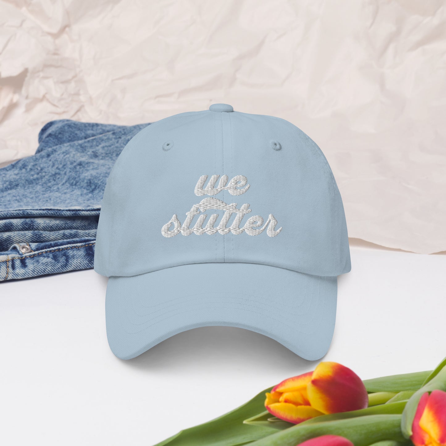 Show your solidarity with Team Stuttering at the National Stuttering Association (NSA) Conference 2024 in St. Louis with this funky retro "We Stutter" embroidered "dad hat"!  ⭐Permission Granted to use National Stuttering Association Logos and Slogans April 17, 2024  A portion of the proceeds will go towards National Stuttering Association (NSA) support groups - thanks for supporting the Normalize Stuttering movement!