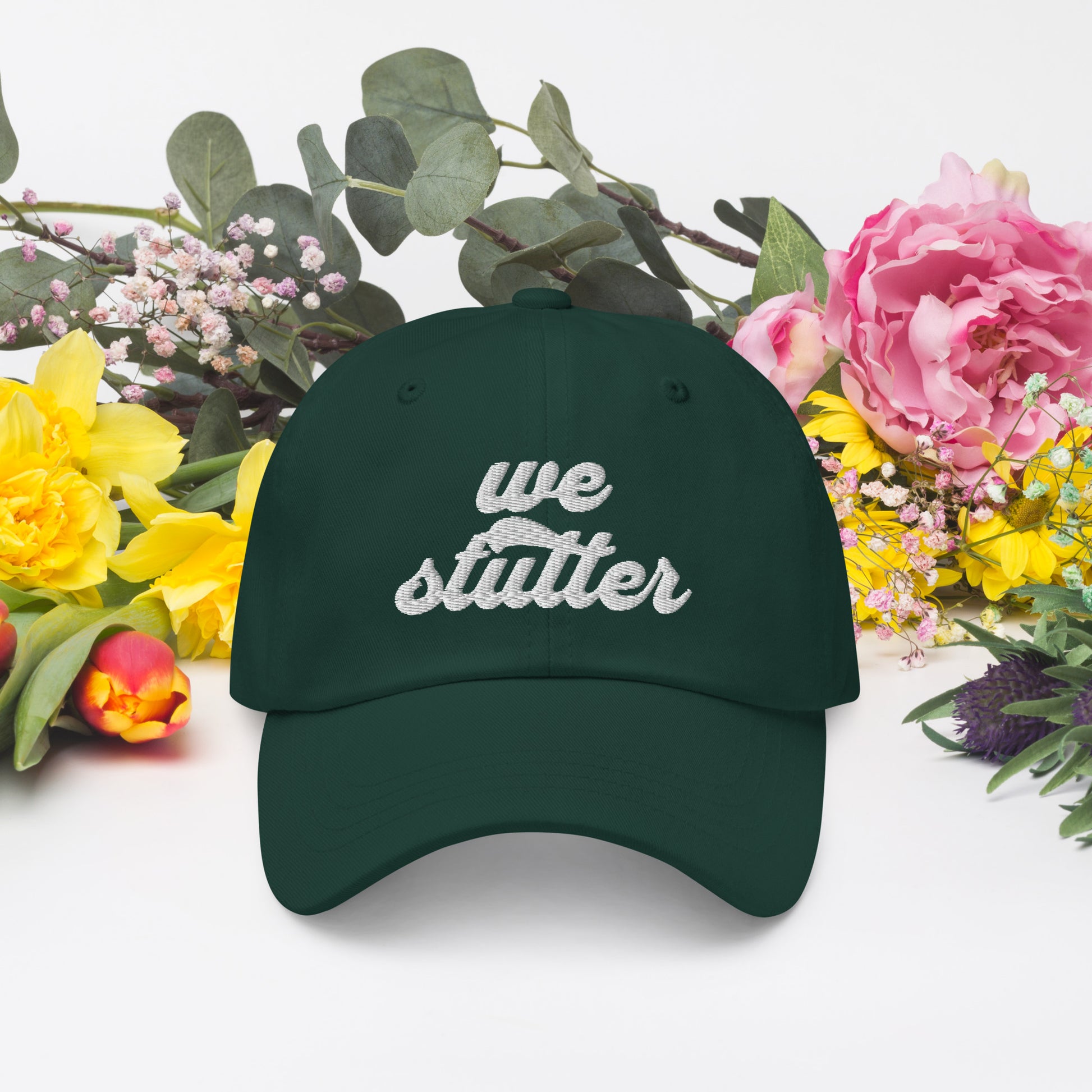 Show your solidarity with Team Stuttering at the National Stuttering Association (NSA) Conference 2024 in St. Louis with this funky retro "We Stutter" embroidered "dad hat"!  ⭐Permission Granted to use National Stuttering Association Logos and Slogans April 17, 2024  A portion of the proceeds will go towards National Stuttering Association (NSA) support groups - thanks for supporting the Normalize Stuttering movement!